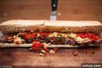 Gourmet Seared Duck Breast Sandwich with Artichoke Hearts and Roasted Red Peppers