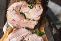 Buzhenina: Aromatic Spice-Rubbed Pork Roast with Herb and Garlic Stuffing