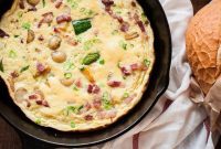Loaded French Omelette with Bacon, Potatoes and Zucchini