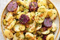 Hearty German Double Potato Salad with Crispy Bacon and Zesty Chive Vinaigrette
