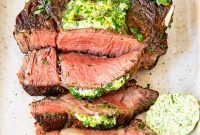 Prime Tomahawk Perfection: Grilled with Aromatic Herb Butter