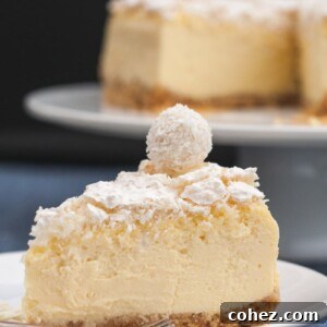 slice of cheesecake on a plate with the rest in the background