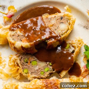 slices of ground beef wellington with gravy