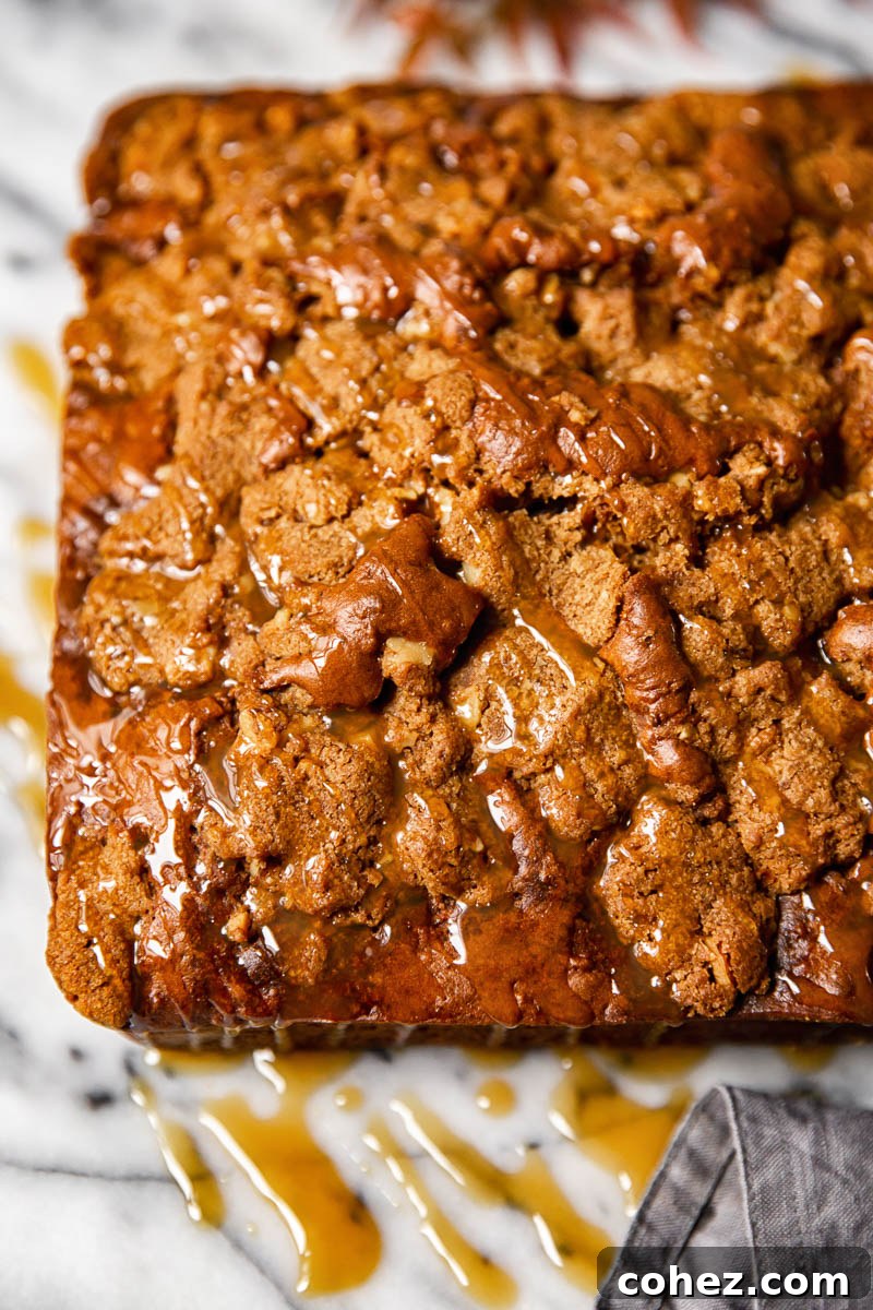 Top down view of a beautifully baked apple spice cake with streusel topping