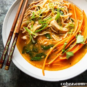 Chicken noodle soup in bowl with chopsticks