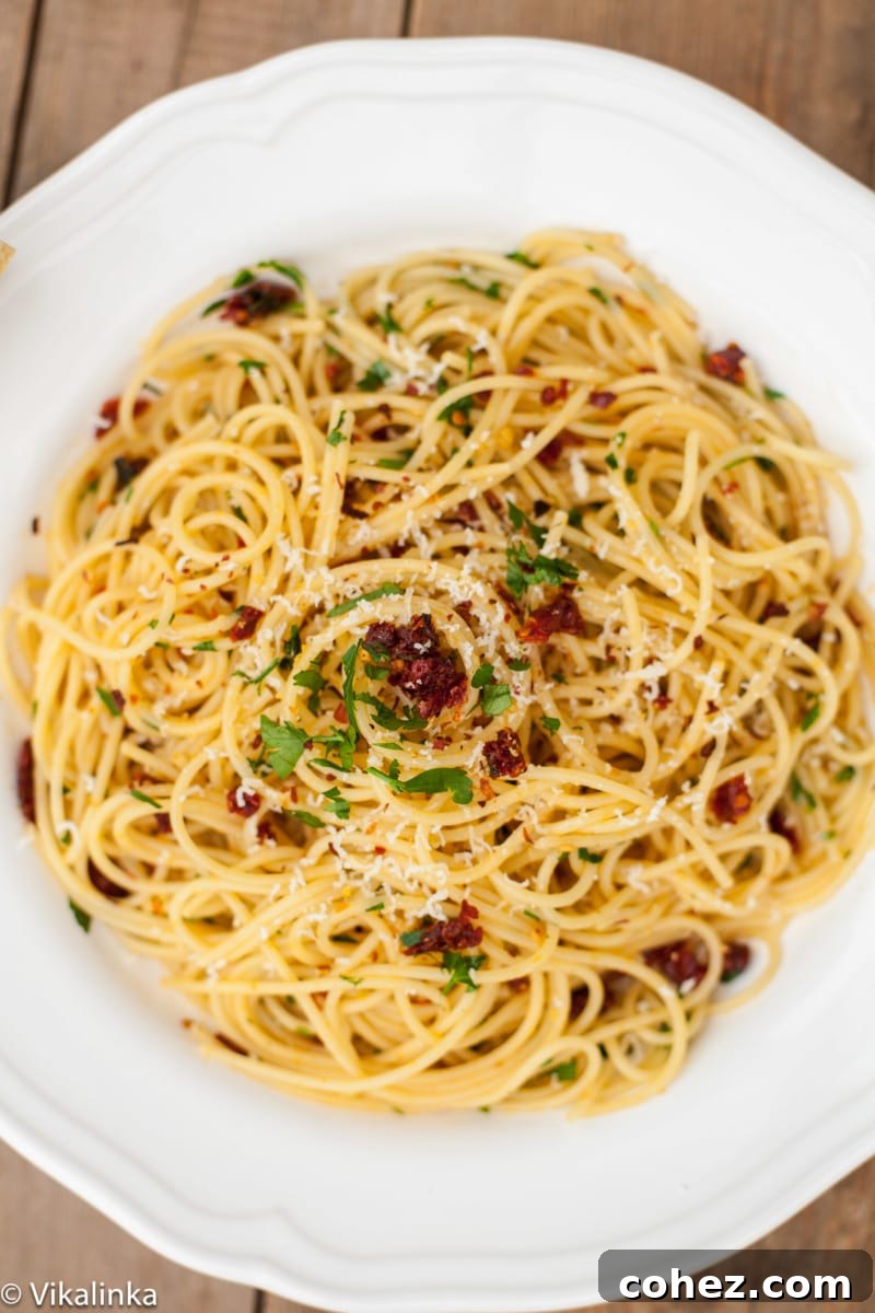 Authentic Sicilian Spaghetti 4 Spaghetti alla Siciliana served with fresh parsley and grated cheese