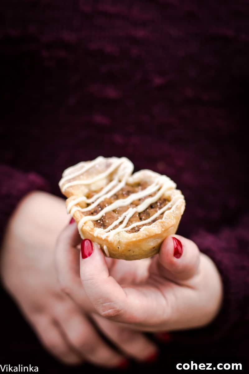 Maple Butter Tart held by a hand