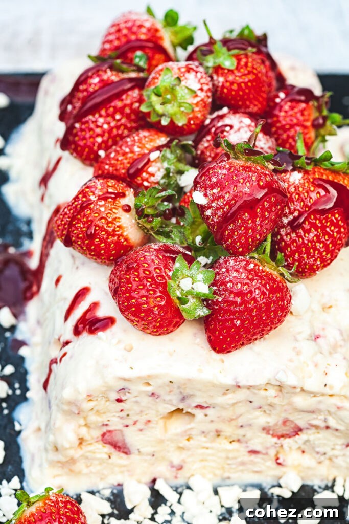 High angle view of semifreddo with fresh strawberries piled on top