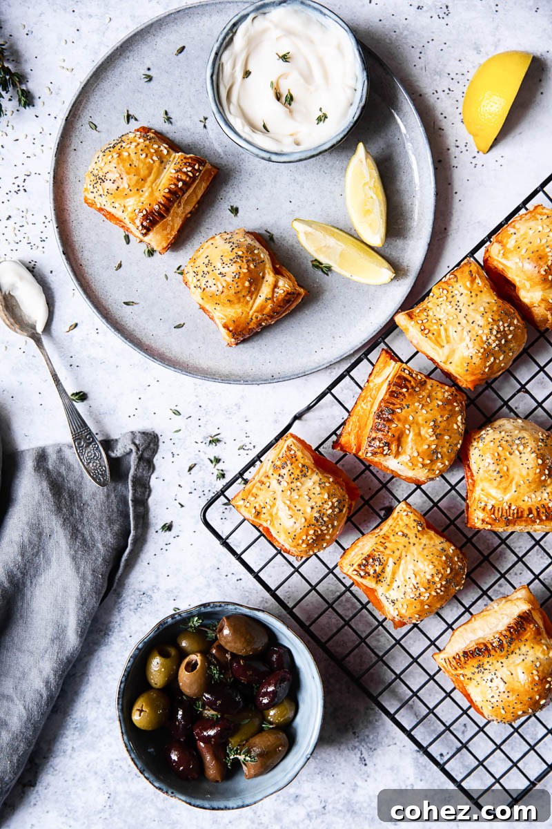Chorizo Sausage Rolls arranged neatly from a top-down view, some on a wire rack
