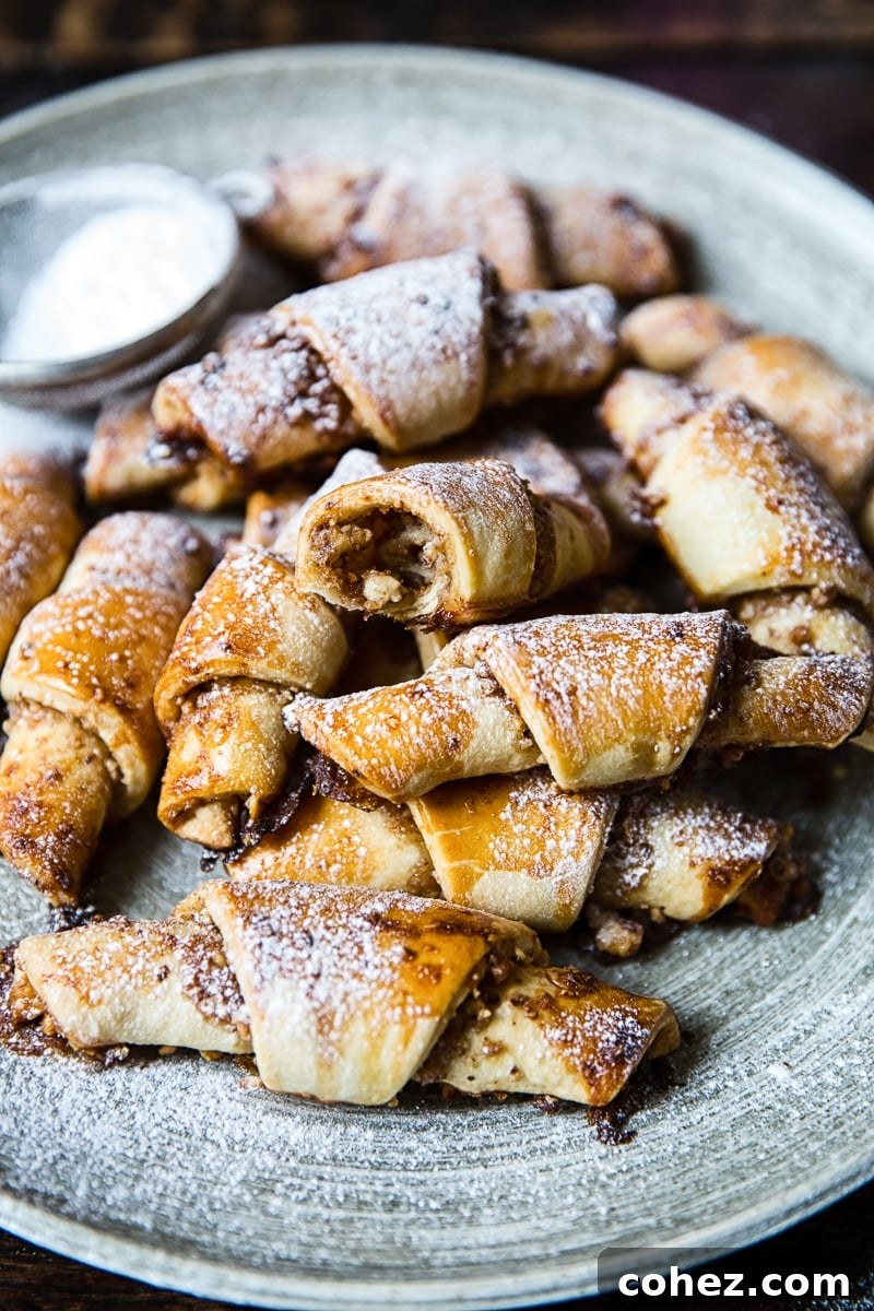 Close-up of freshly baked Honey, Cinnamon and Walnut Rugelach glistening with honey glaze