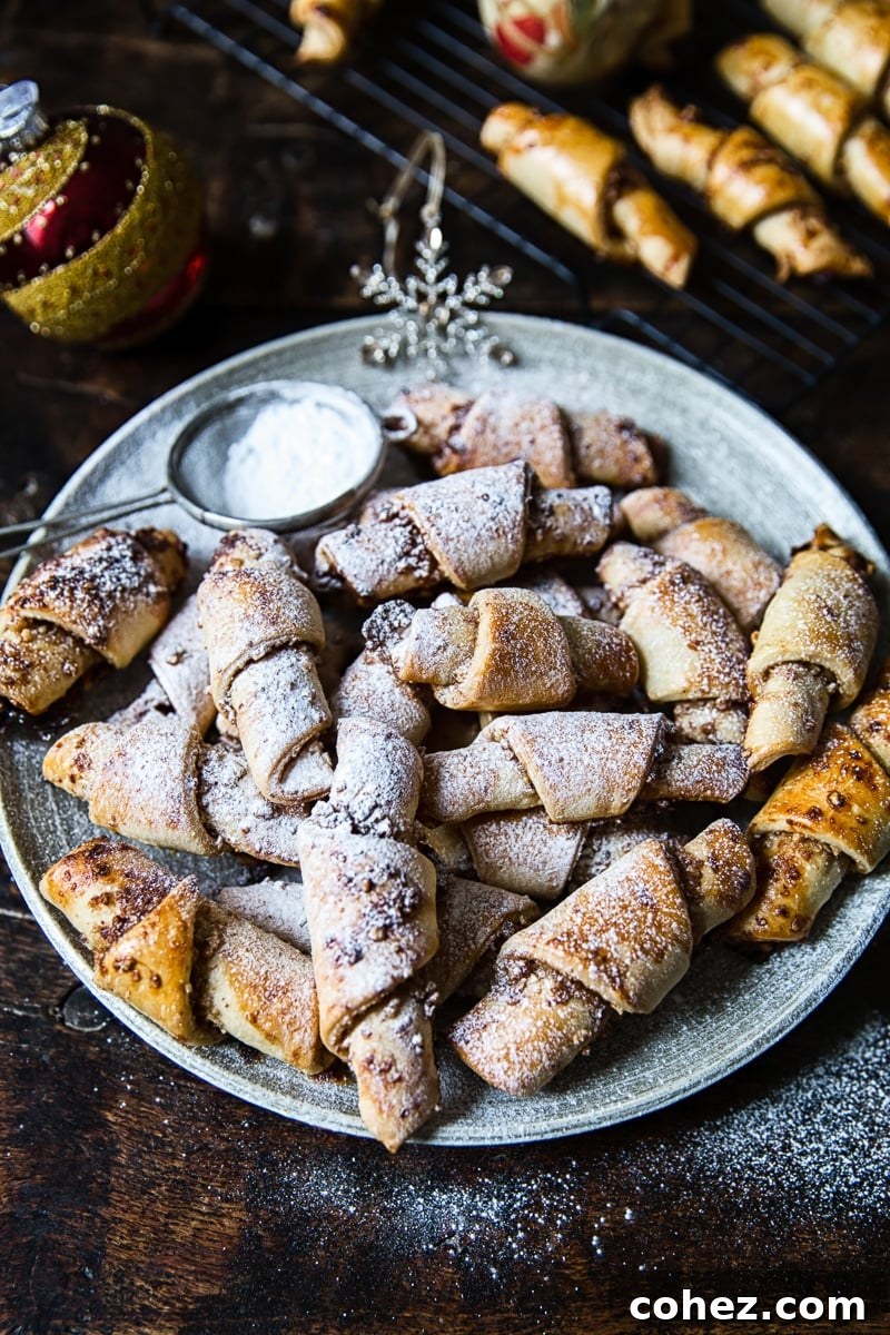 Various Rugelach fillings displayed on a board, including walnuts, cinnamon, and honey