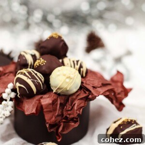 Close-up of Baileys Truffles in a rustic brown pot.