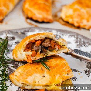 Cornish Comfort Steak and Sweet Potato Pasty 6 Cornish pasty broken into two on a plate
