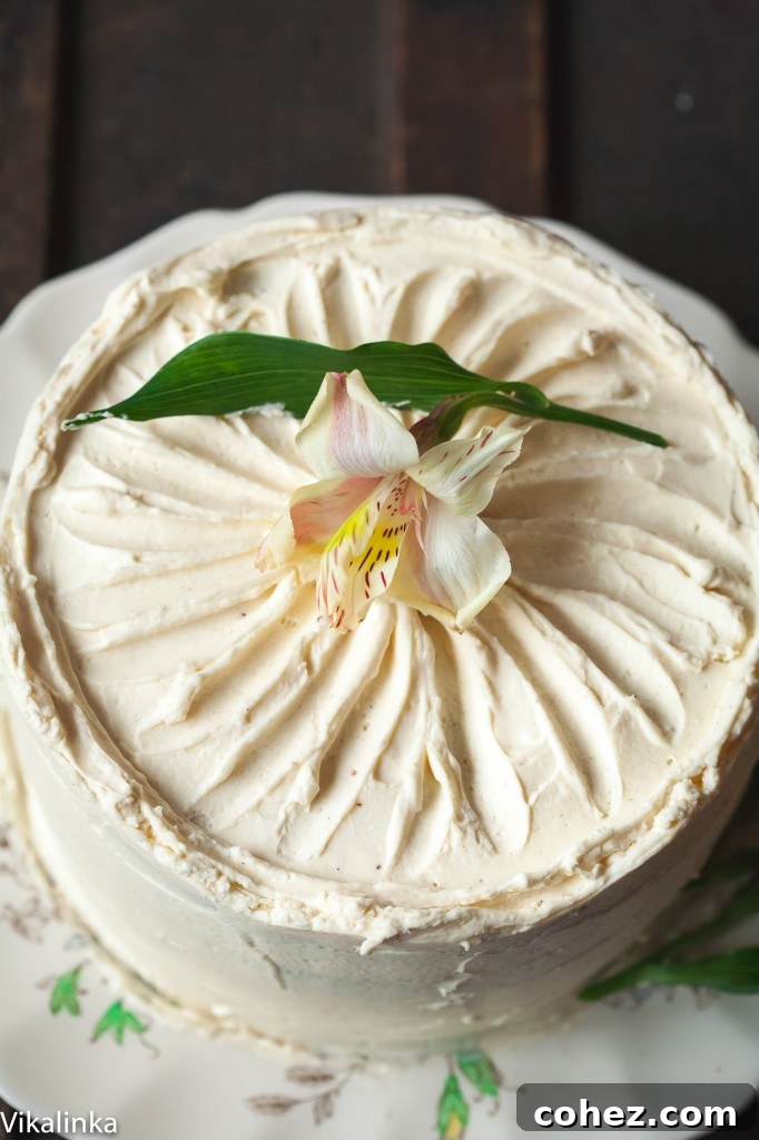 An overhead view of the entire pumpkin and chocolate cake, showcasing its beautifully frosted top and elegant presentation