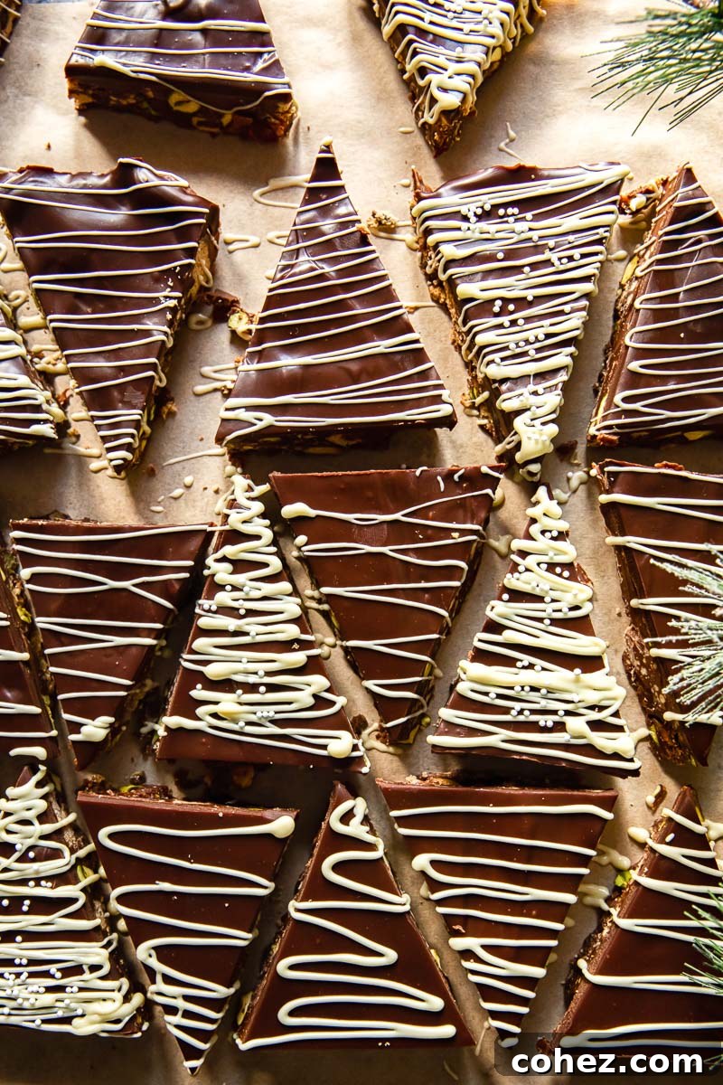 No-Bake Bliss Bars 7 Close-up of fridge cake bars cut into mini Christmas trees, decorated