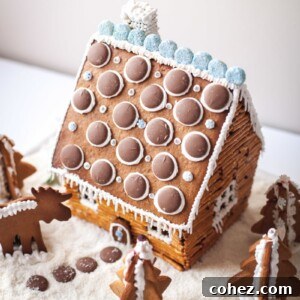 Rustic gingerbread log cabin decorated for Christmas