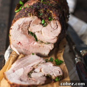Side view of sliced pork on cutting board, highlighting the perfect cook and infused flavors.