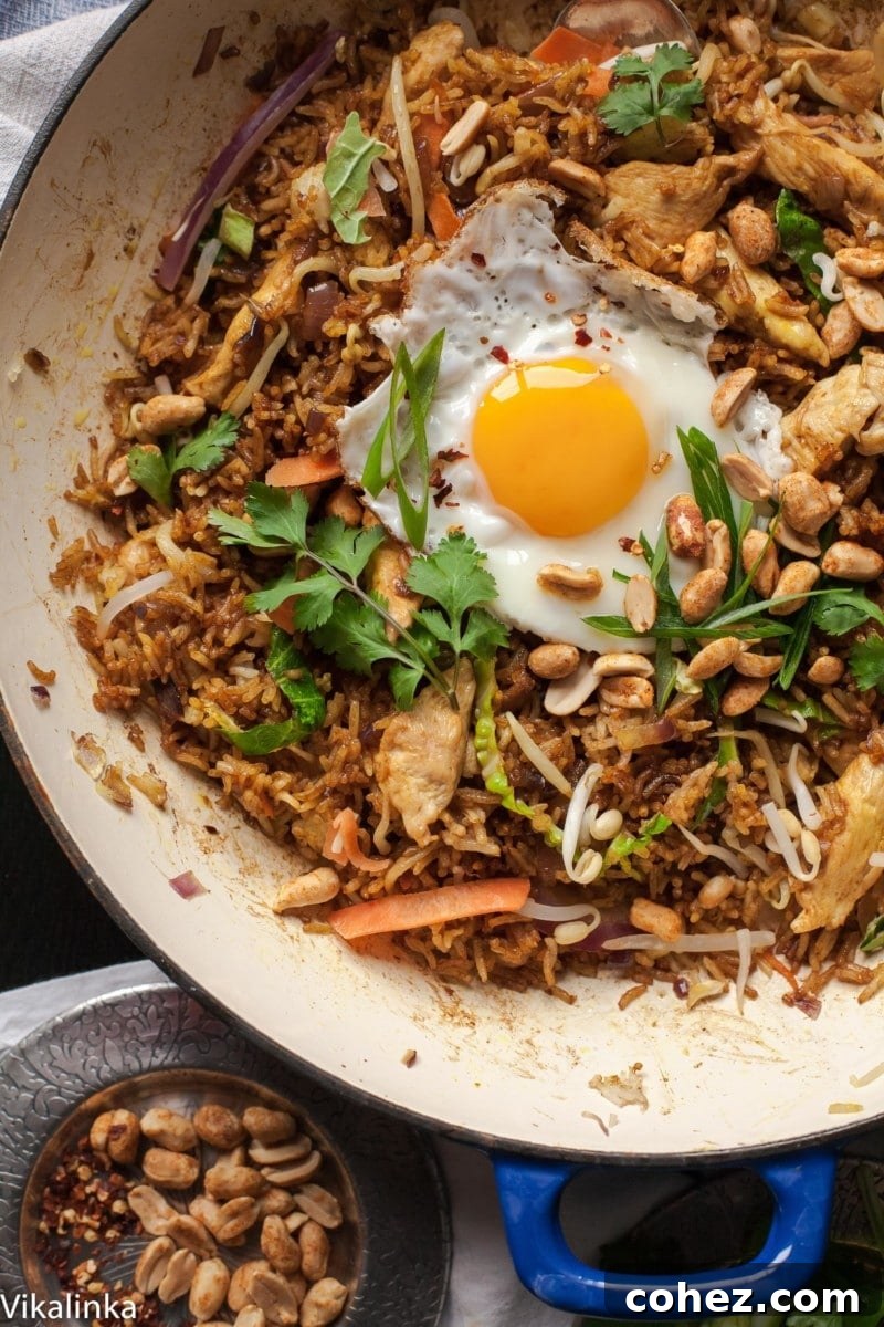 20-Minute Nasi Goreng Authentic Indonesian Fried Rice 2 Top down of fried rice Nasi Goreng, showcasing its vibrant colors and inviting texture