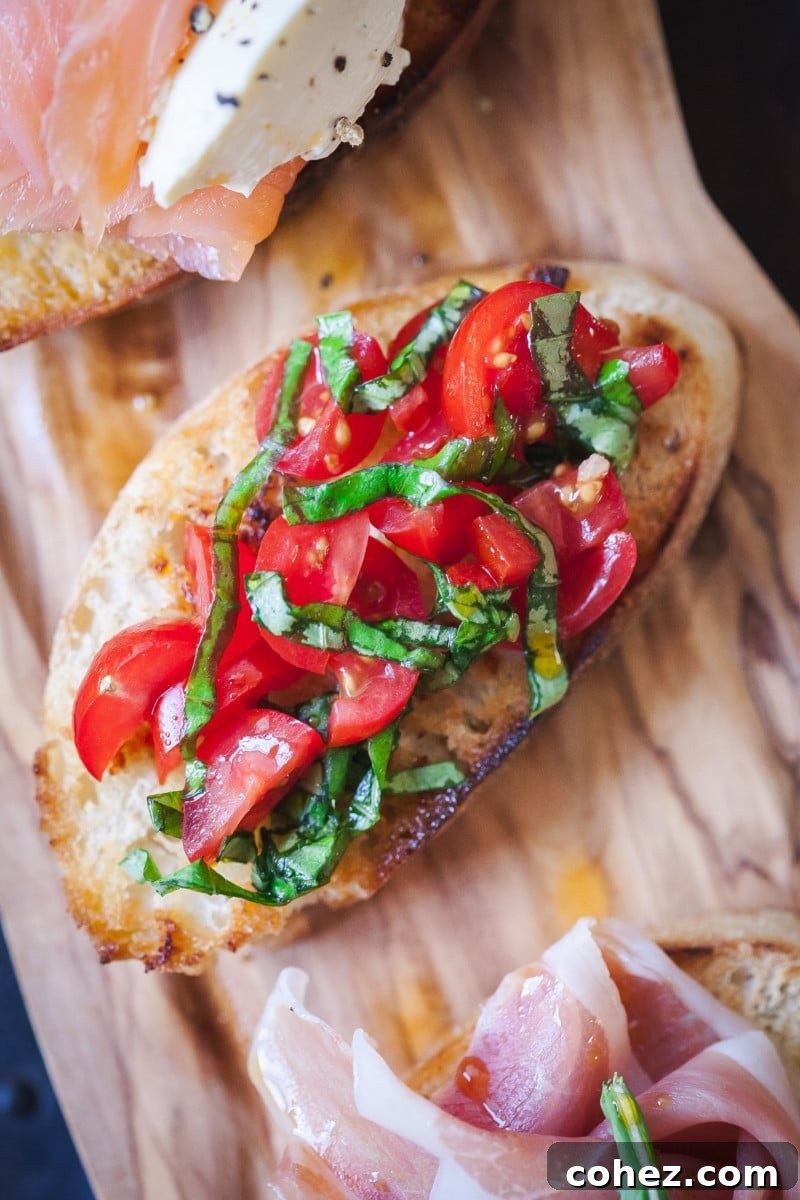 crostini topped with tomato and basil