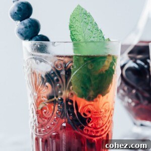 Close-up of a sparkling Vermouth Cassis cocktail ready to be served.