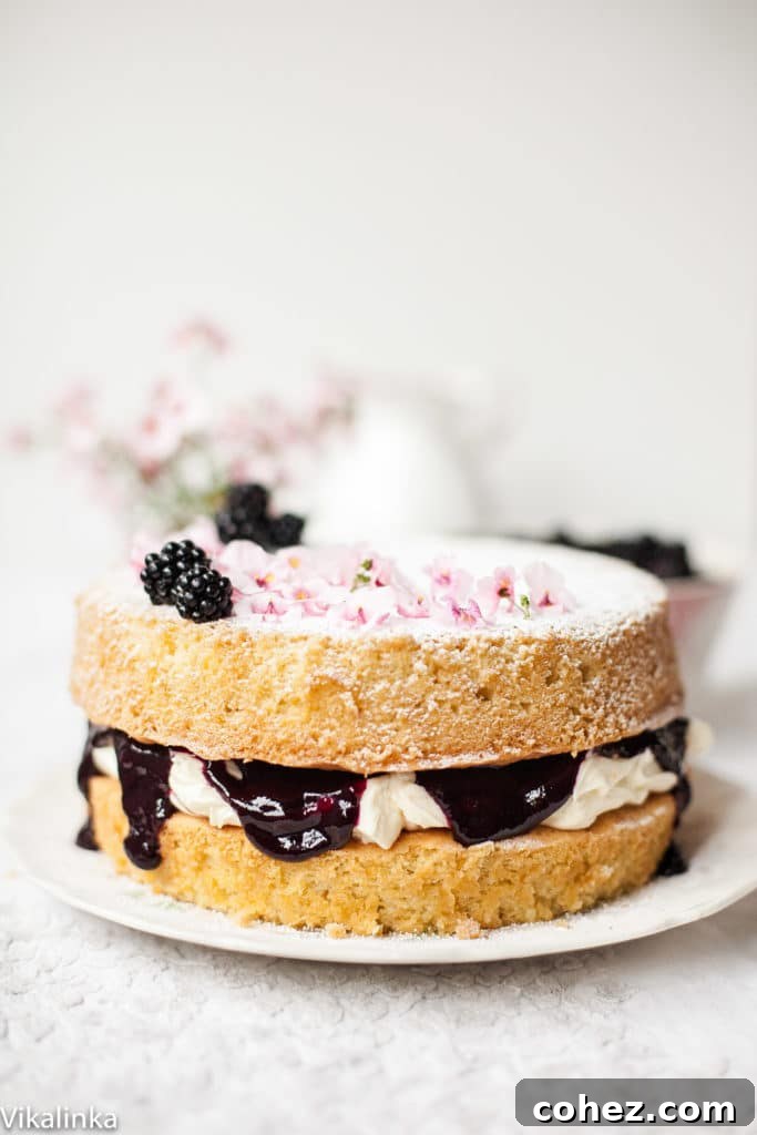 Classic Victoria Sponge Cake with Cream and Berries