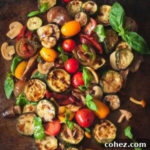 warm zucchini salad with cherry tomatoes, peppers and mushrooms