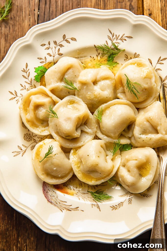 Classic Siberian Pelmeni 2 close up of pelmeni dumplings on a plate
