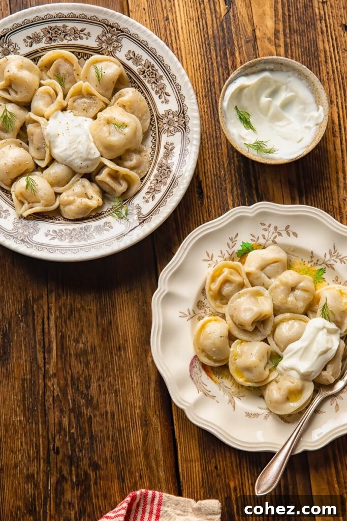 Classic Siberian Pelmeni 7 top down view of a bowl and a plate with pelmeni