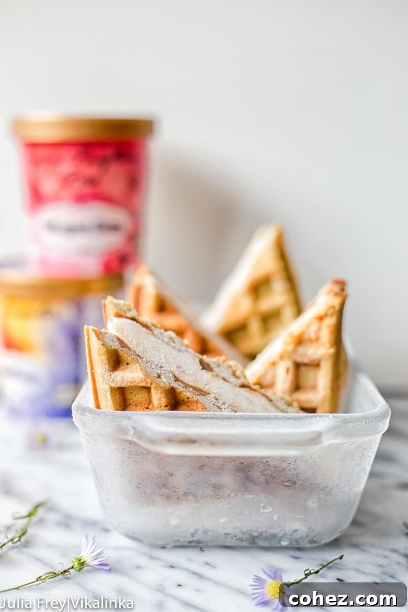 Frozen baking tin with homemade waffle ice cream sandwiches inside, ready to be enjoyed.