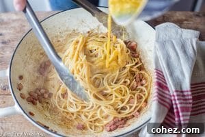 Effortless Cream-Free Carbonara Sauce 12 Egg mixture poured over pasta
