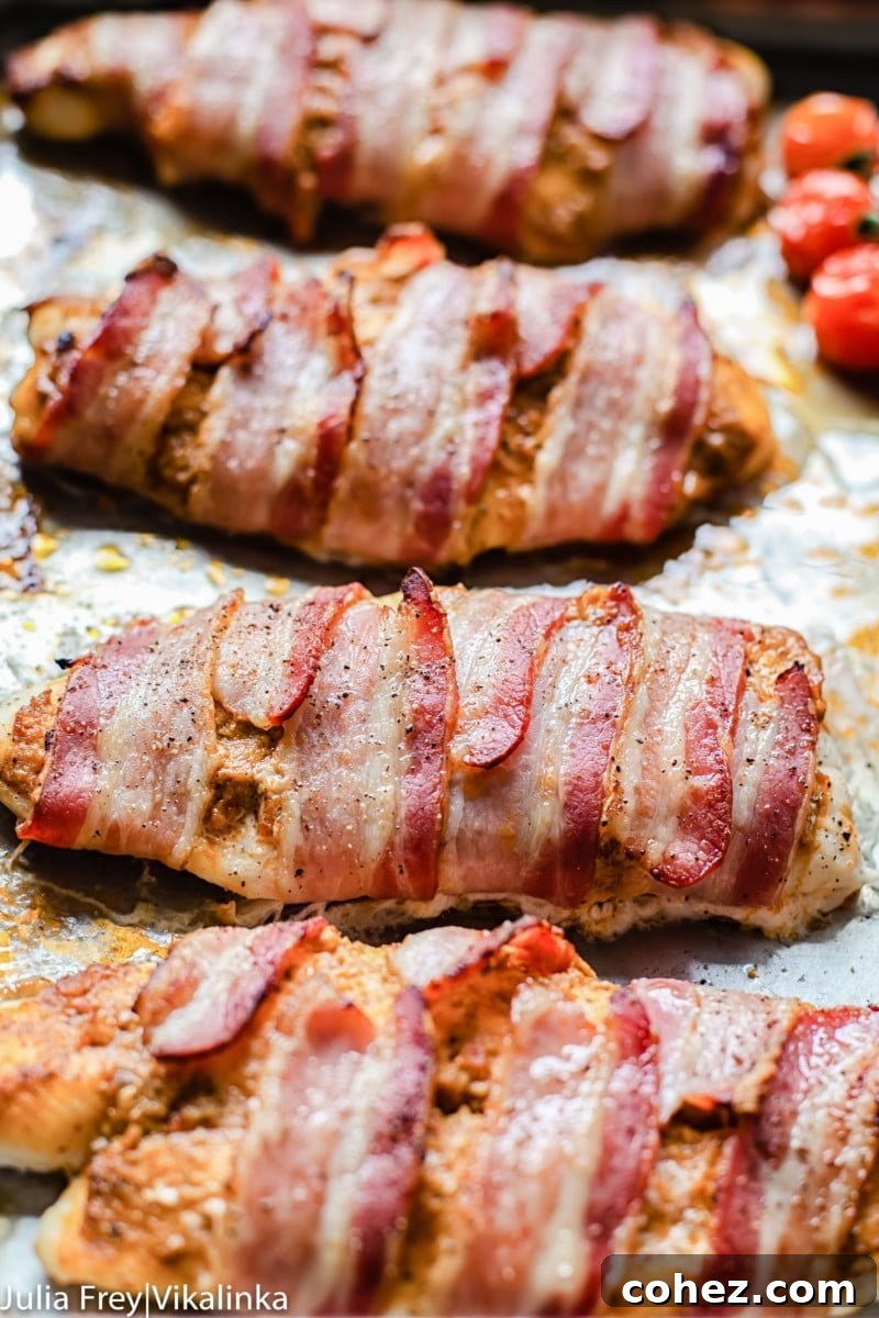 Fish Fillets in Bacon Blankets with Sun-Dried Tomato Pesto 6 Plated bacon-wrapped fish with sun-dried tomato pesto and roasted cherry tomatoes, served with fresh greens. A quick, easy, and flavorful dinner using just 4 main ingredients.