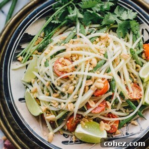 Top down of Thai green papaya salad in a bowl