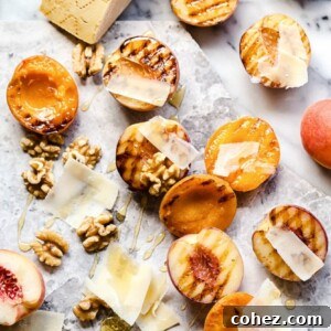 Apricots and peaches showing grill marks and other ingredients on marble