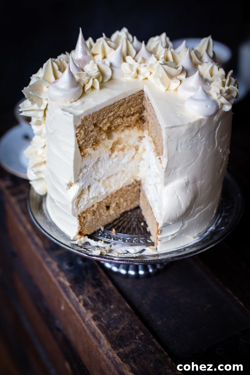 A slice removed from the stunning Earl Grey meringue cake, revealing its beautiful layers.
