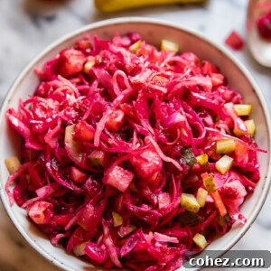 red cabbage and beet salad in a grey bowl