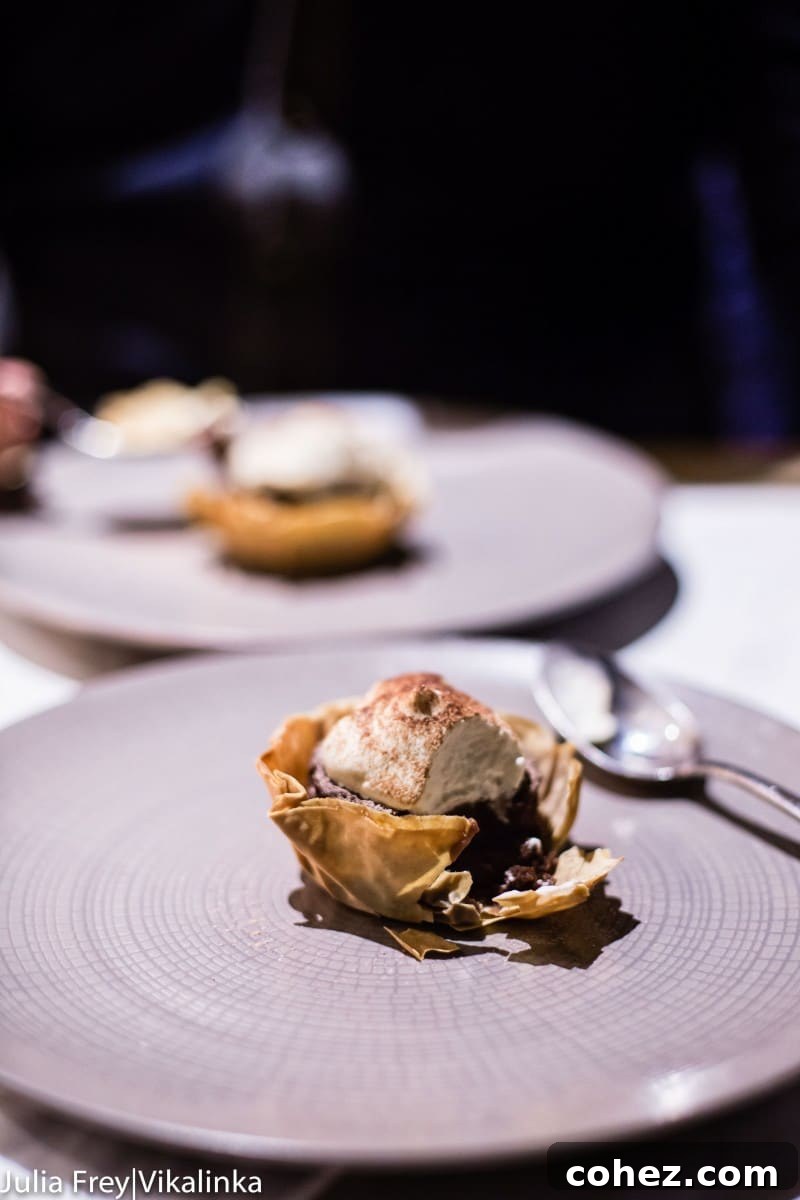 A beautifully presented starter from Phantom Pig's A Christmas Carol menu, featuring delicate garnishes and vibrant colors.