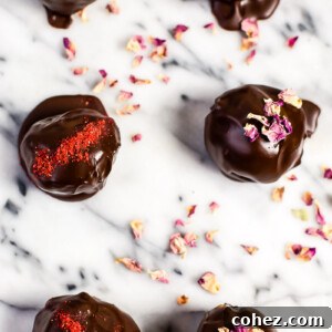 top down view of 6 chocolate cake truffles, finished and ready to serve