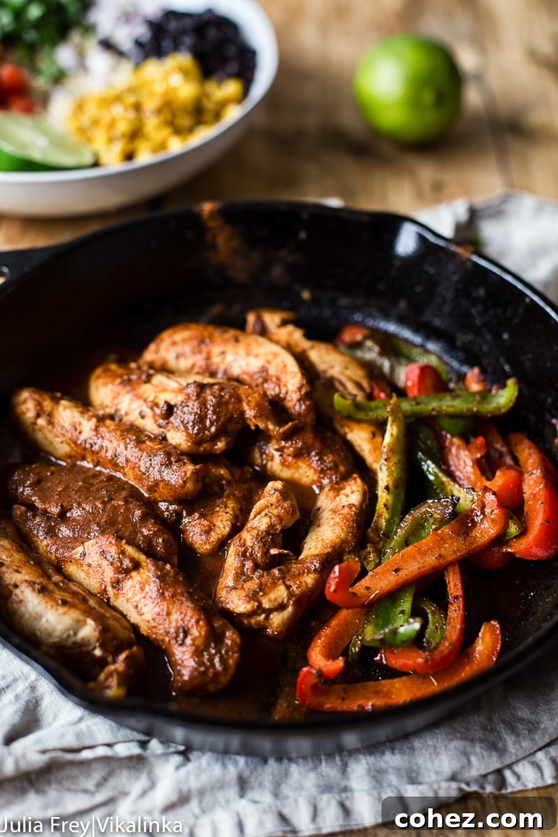 A close-up of a fully assembled Chicken Fajita Bowl, emphasizing the freshness and visual appeal of the ingredients.