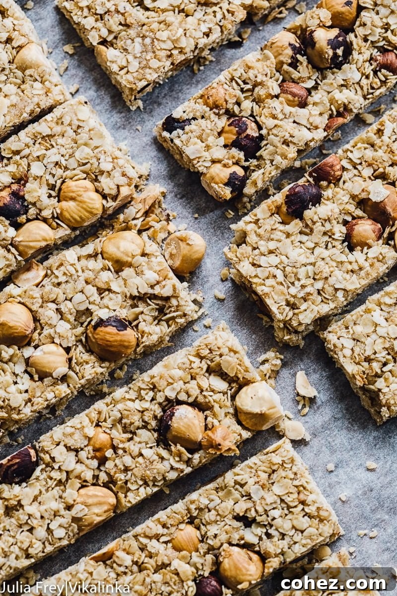 Golden Manuka Granola Bars 3 Granola bar squares arranged neatly, highlighting their golden-brown color