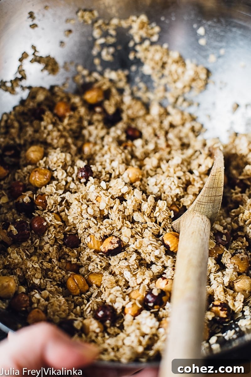 Golden Manuka Granola Bars 5 Close-up of granola bar mixture in a bowl, showing the consistency before baking