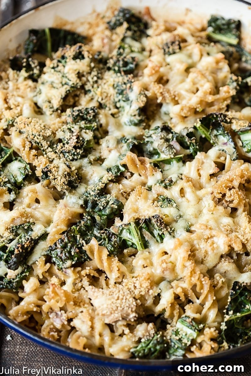 Homemade Tuna Noodle Casserole with fresh kale ready to be baked