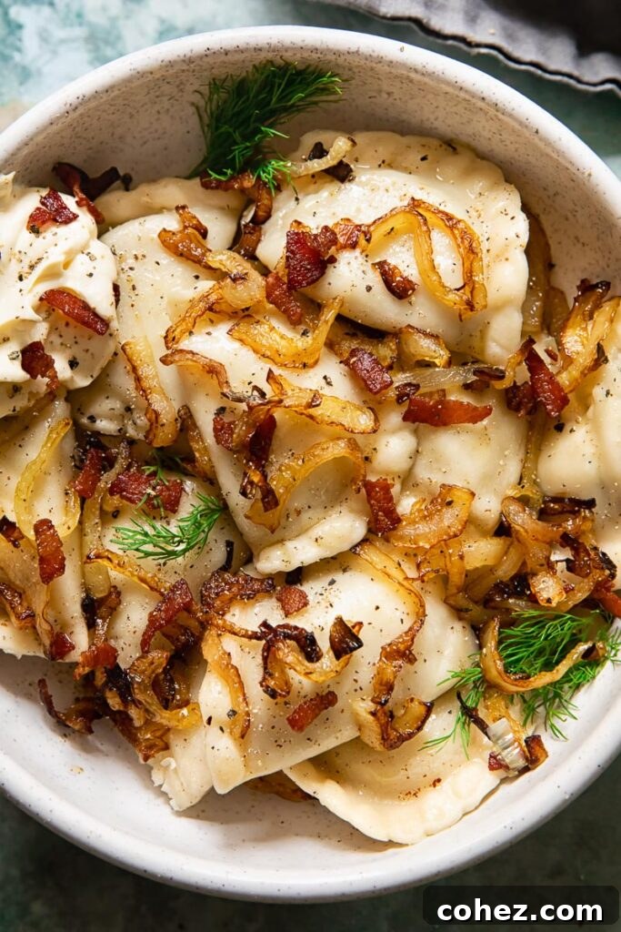 dumplings topped with fried onions and bacon in a bowl