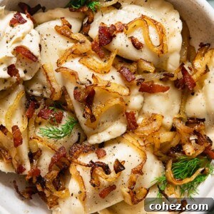 dumplings topped with fried onions and bacon in a bowl