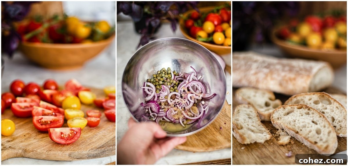 Ingredients for Panzanella salad dressing, sliced bread, and halved tomatoes arranged on a rustic wooden surface.