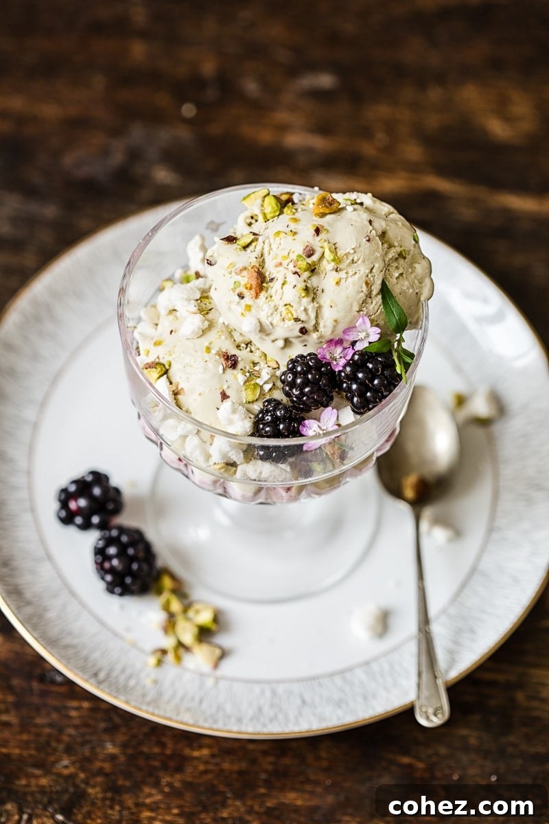 Dish of the Eton mess on a saucer with a spoon