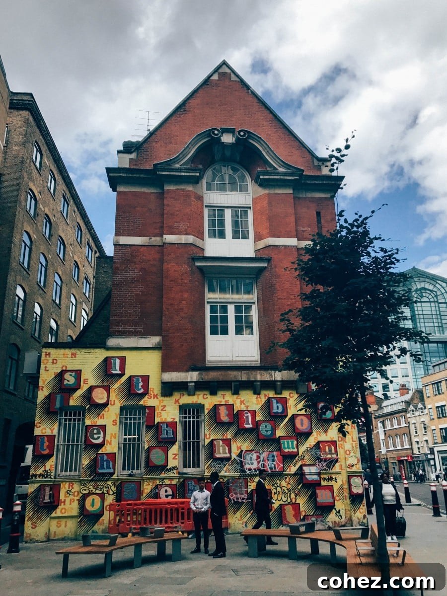 Unveiling Shoreditch's Urban Canvas 9 A vibrant and detailed piece of Shoreditch street art on a brick wall, showcasing intricate patterns and colours