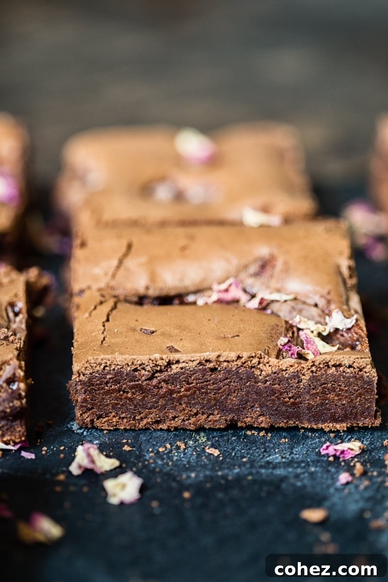 Rosewater Infused Chocolate Brownies 6 Turkish Delight Brownies artfully arranged and shown from the side, highlighting their thickness and alluring layers