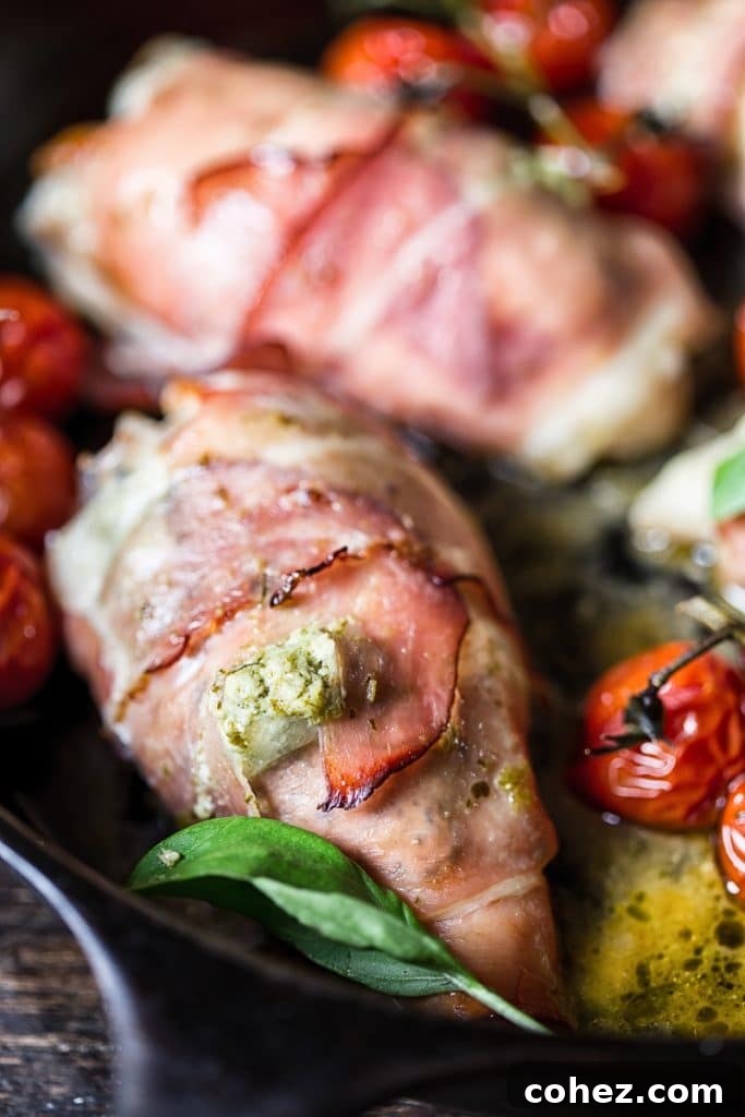 Close up of a chicken parcel wrapped in prosciutto