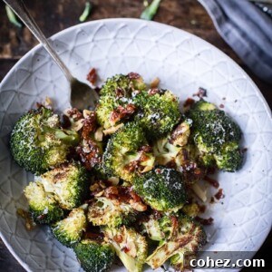 roasted broccoli with sun-dried tomatoes in a grey bowl, ready to serve