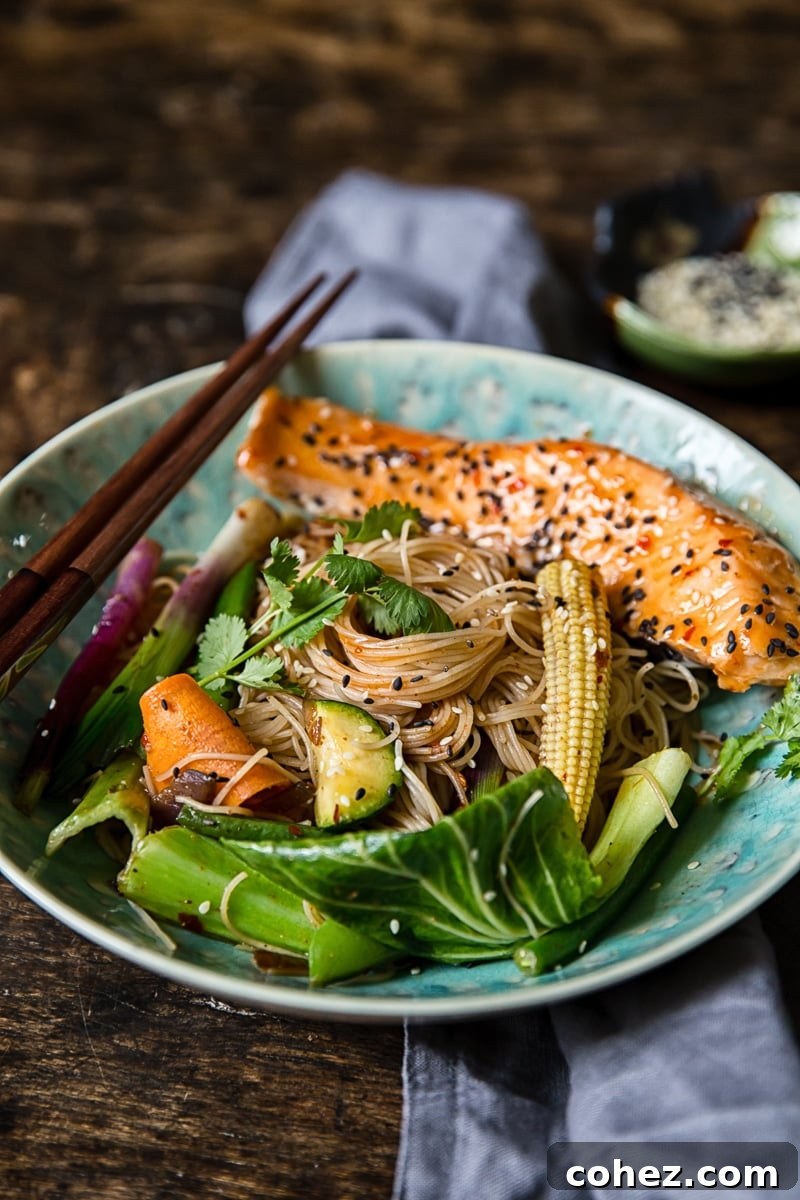 Spicy Salmon Mee Goreng 4 Bowl of chilli lime salmon mee goreng with chopsticks